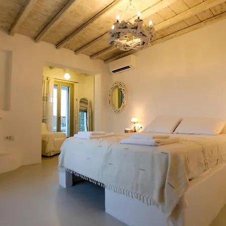Апартаменты Magnificent Mykonos Nexus 2 Bedrooms Private Terrace With Jacuzzi Outdoor Dining Area & Bbq *