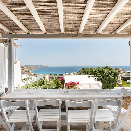 Апартаменты Magnificent Mykonos Nexus 2 Bedrooms Private Terrace With Jacuzzi Outdoor Dining Area & Bbq
